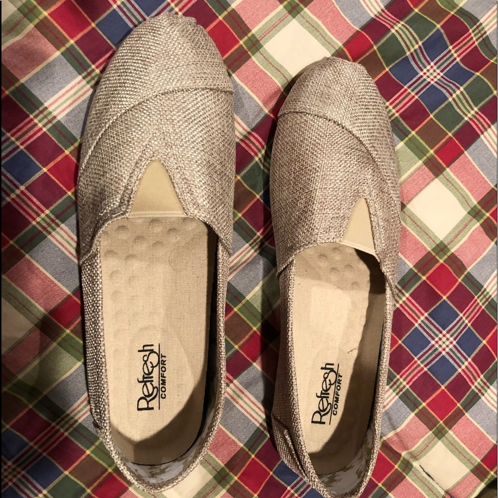 Tan slip on flats. NWOT